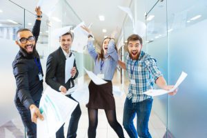 National Marketing Day - Image is of four young people at work celebrating.