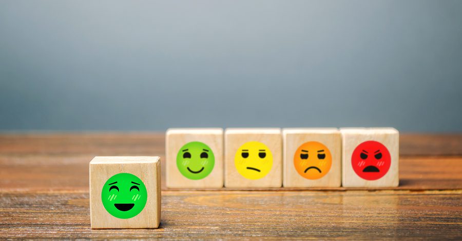 emojis about feelings on wooden blocks